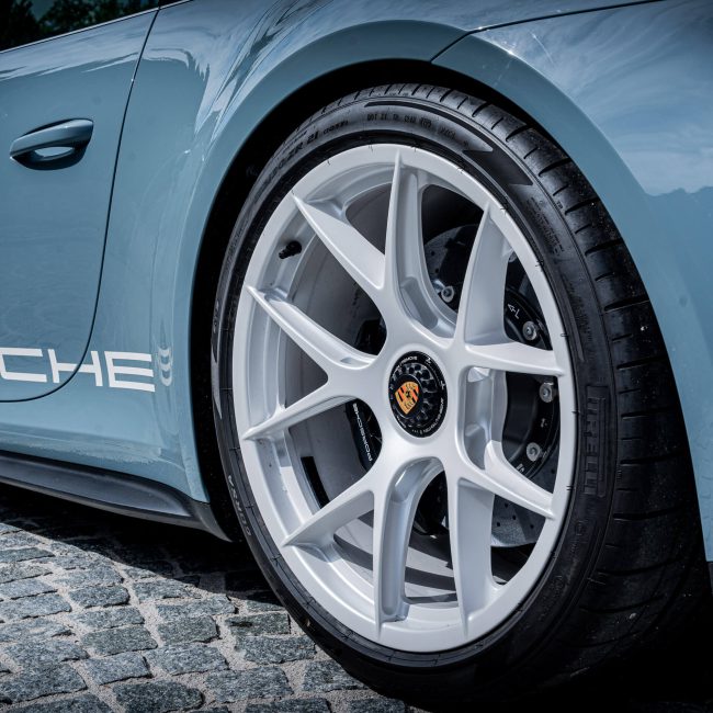 Close-up of Porsche Rim and Door with Race Number, Sports Car Kitzbühel Luxury Car